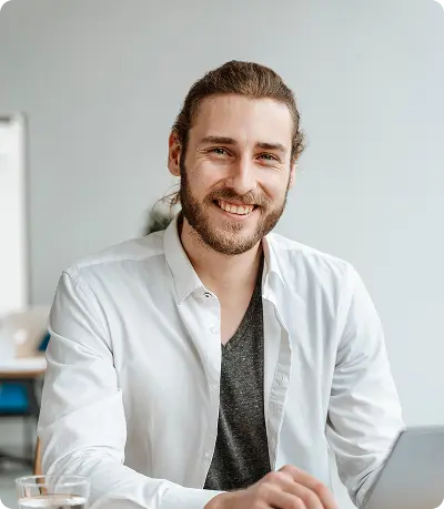 Professional man smiling in office environment